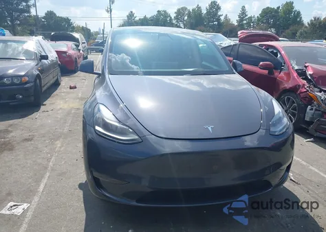 2022 Tesla Model Y Performance Dual Motor All-Wheel Drive z USA, uszkodzony, nr VIN 7SAYGDEF7NF339241